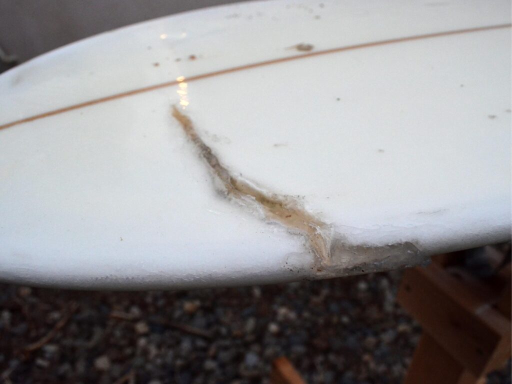 a damaged surfboard