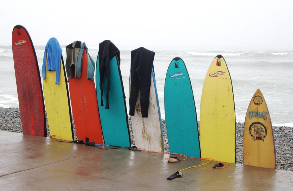 a couple of surboards parked