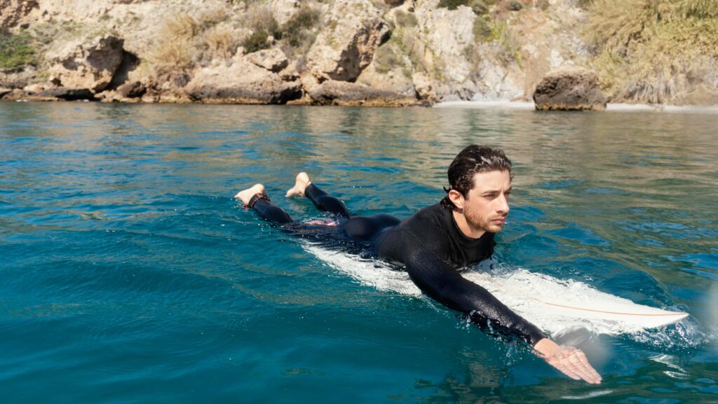 surfing with a zipperless suit