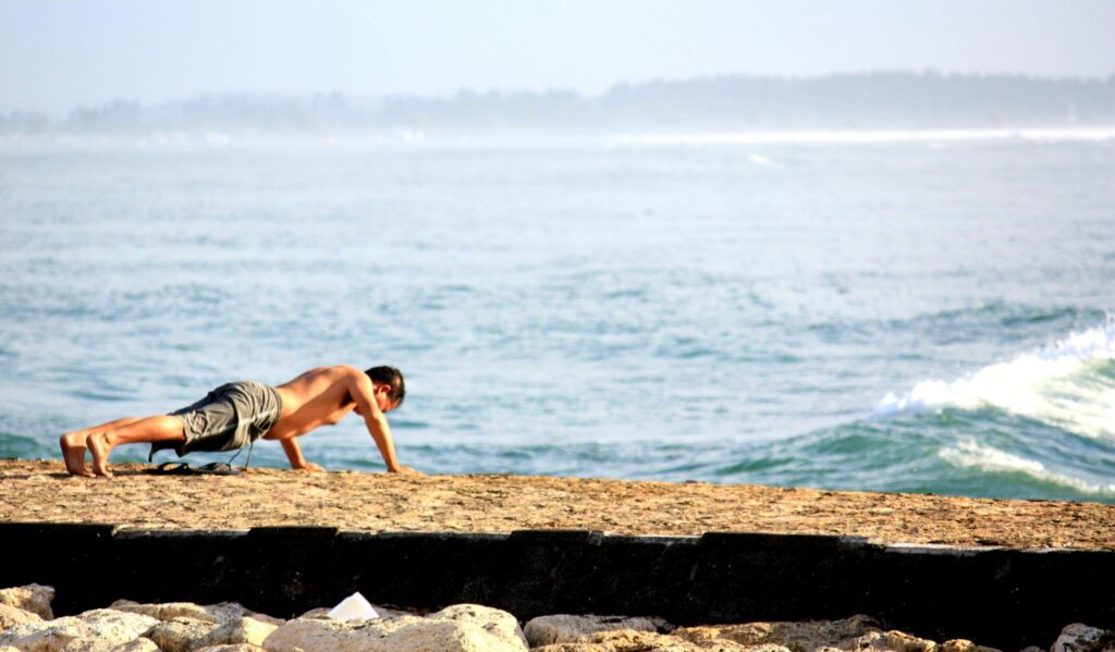 push ups next to the beach