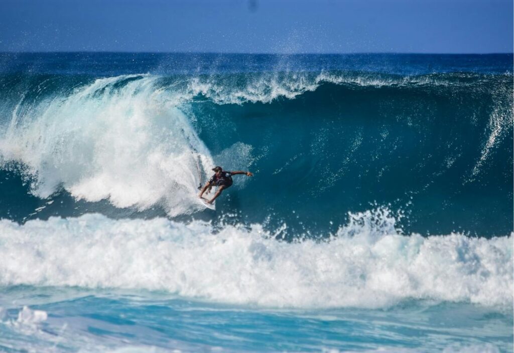 a surfer riding a wave