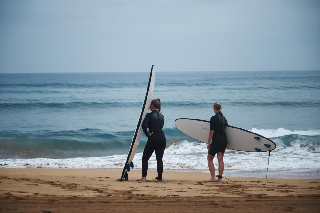 a couple surfing