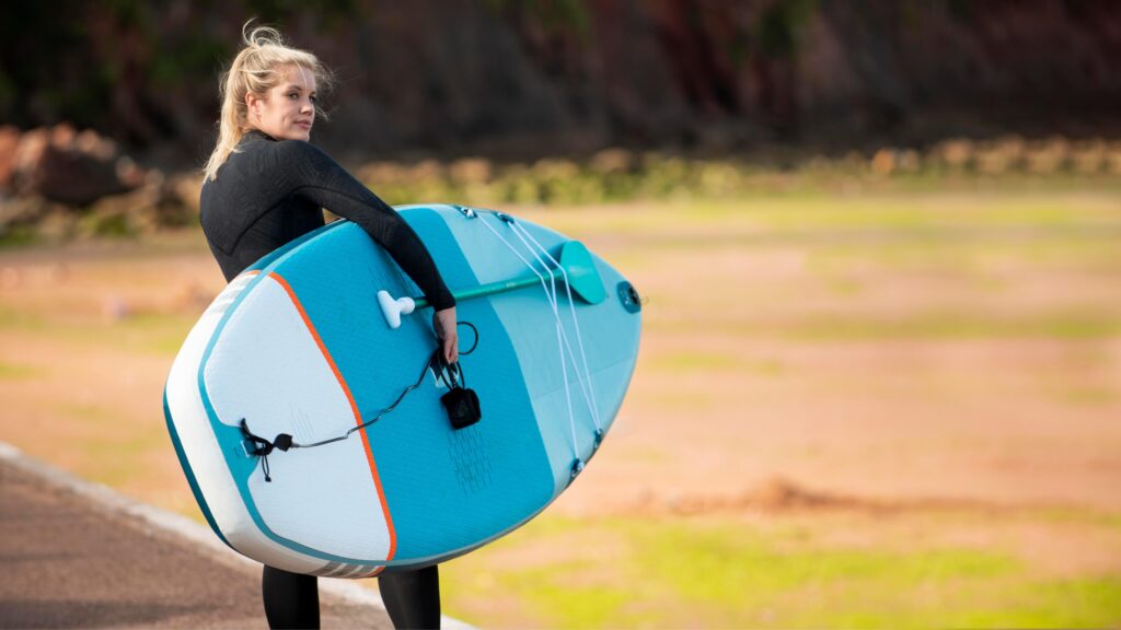 holding a surf while waiting for friends to join