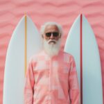 a cool guy with two surfboards